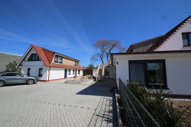 P: Zollhaus Klein Zicker - exklusive Wohnungen mit Ferienwohnung  Ostseeinseln